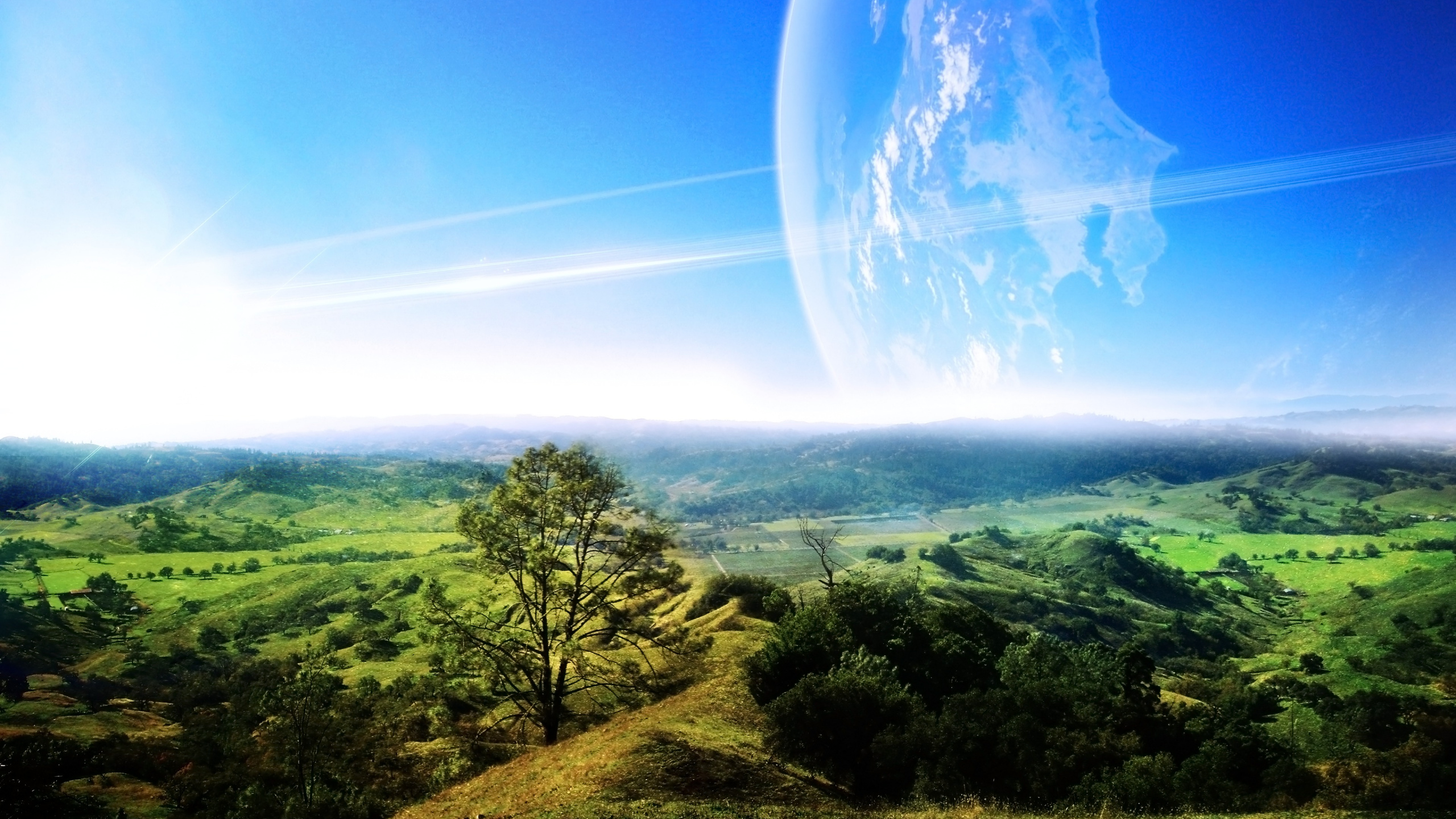 Árboles Verdes y Montañas Bajo un Cielo Azul Durante el Día. Wallpaper in 2560x1440 Resolution