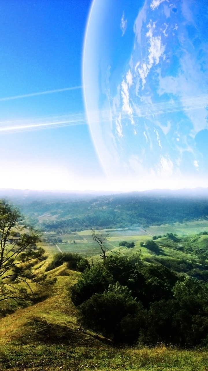 Árboles Verdes y Montañas Bajo un Cielo Azul Durante el Día. Wallpaper in 720x1280 Resolution