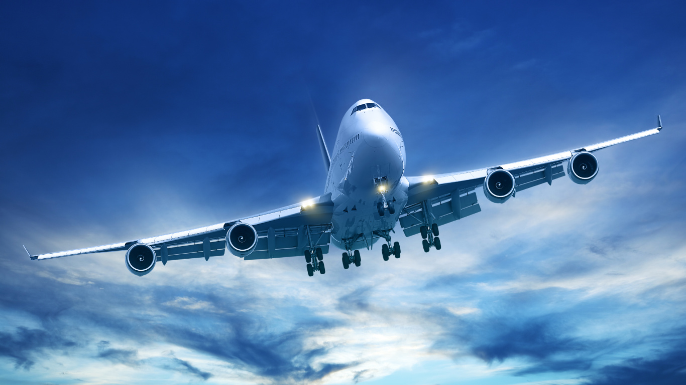 White and Blue Airplane Under Blue Sky During Daytime. Wallpaper in 1366x768 Resolution