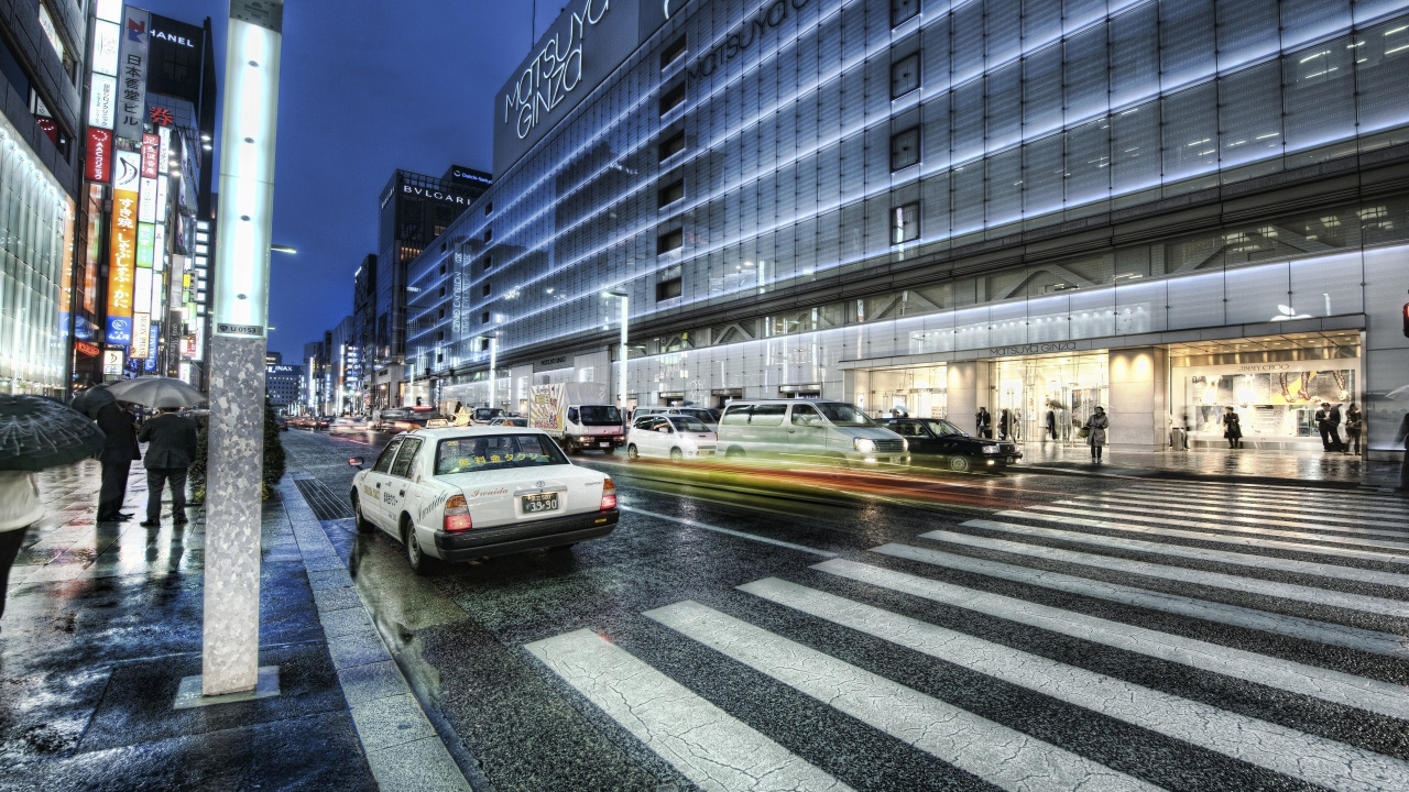 White Sedan on Road Near Building During Daytime. Wallpaper in 1280x720 Resolution