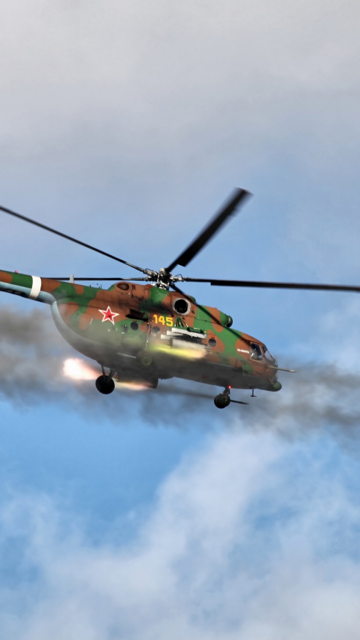 Green and Yellow Helicopter Flying in The Sky. Wallpaper in 720x1280 Resolution
