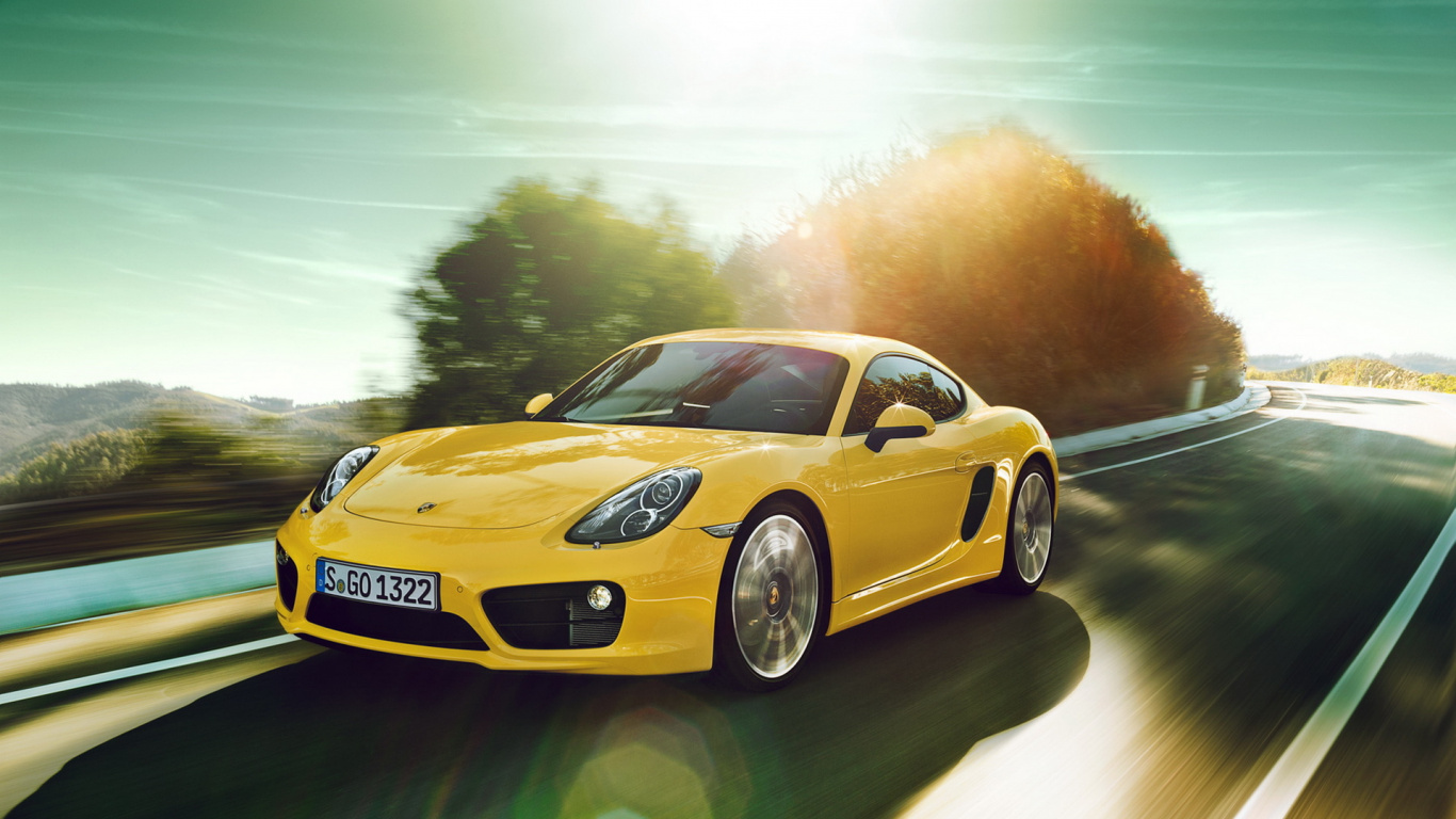 Yellow Porsche 911 on Road During Daytime. Wallpaper in 1366x768 Resolution
