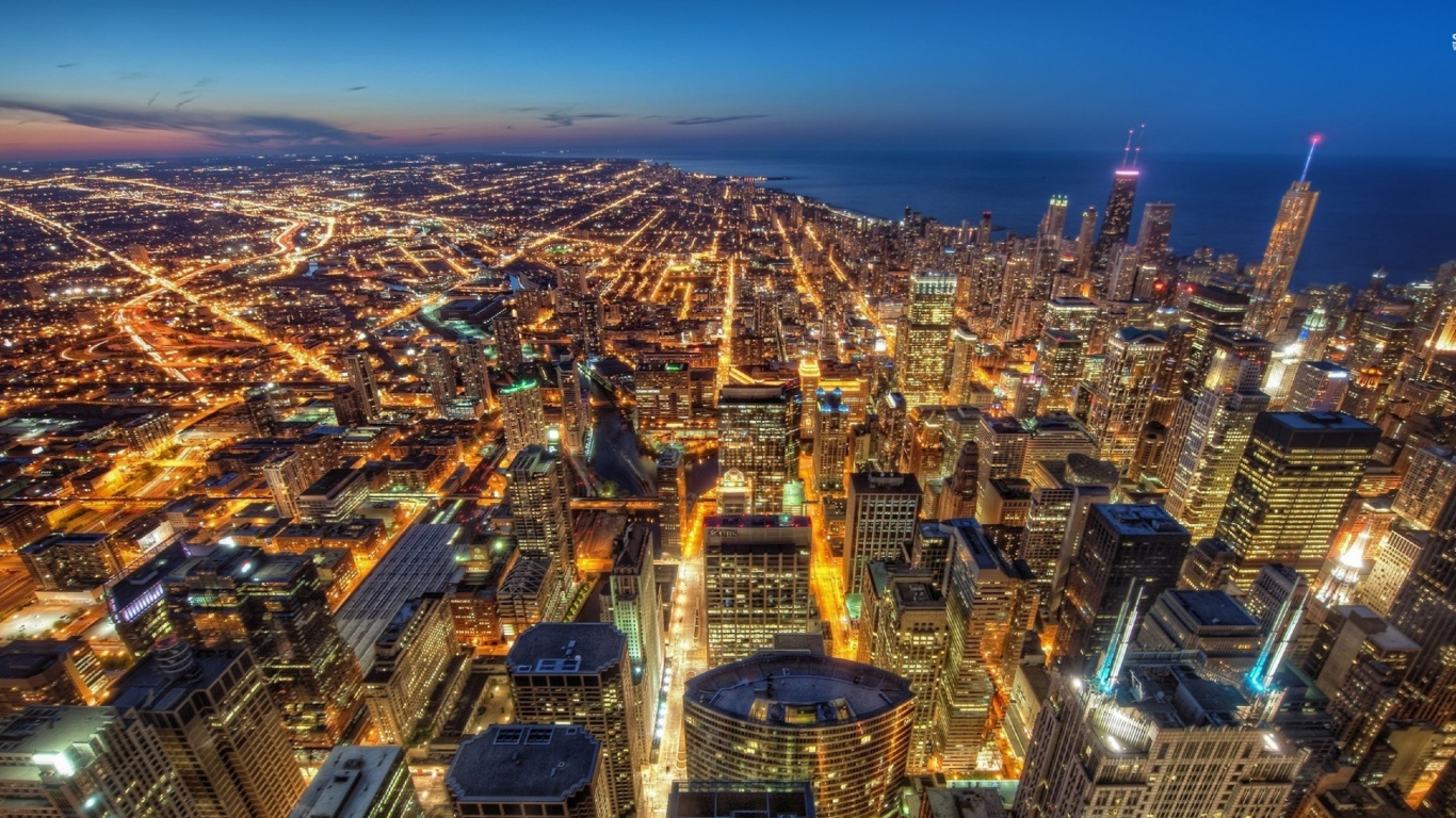 Aerial View of City Buildings During Night Time. Wallpaper in 1366x768 Resolution