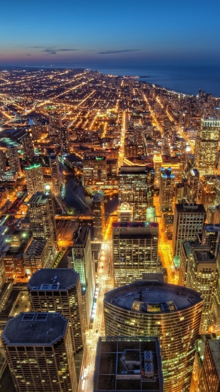 Aerial View of City Buildings During Night Time. Wallpaper in 720x1280 Resolution