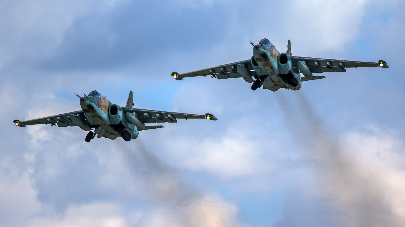 Gray Fighter Plane Flying in The Sky. Wallpaper in 1366x768 Resolution