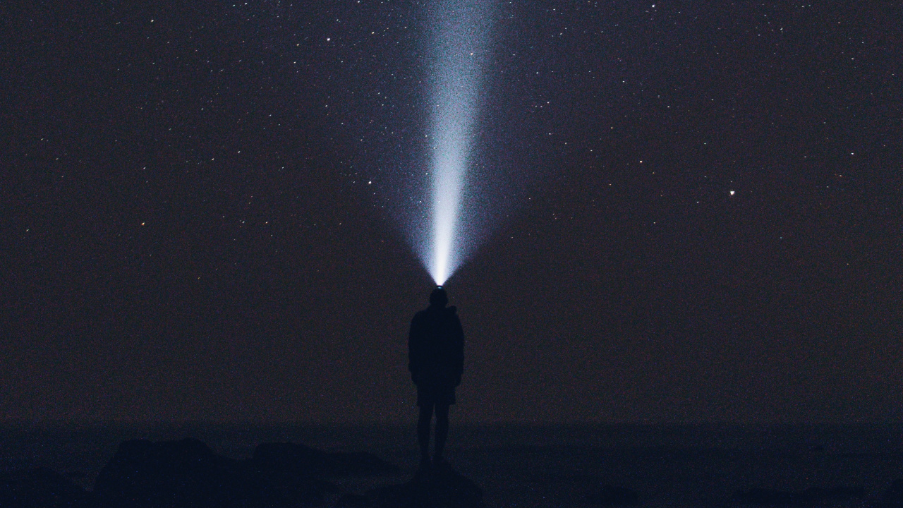 Man in Black Jacket Standing Under Starry Night. Wallpaper in 1280x720 Resolution