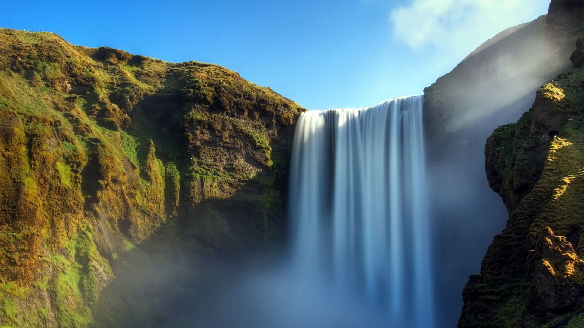 Waterfalls on Rocky Mountain Under Blue Sky During Daytime. Wallpaper in 1920x1080 Resolution