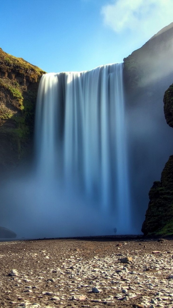 Waterfalls on Rocky Mountain Under Blue Sky During Daytime. Wallpaper in 720x1280 Resolution