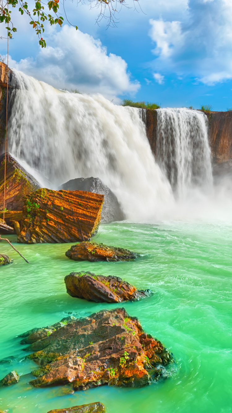 Waterfalls Under Blue Sky and White Clouds During Daytime. Wallpaper in 750x1334 Resolution