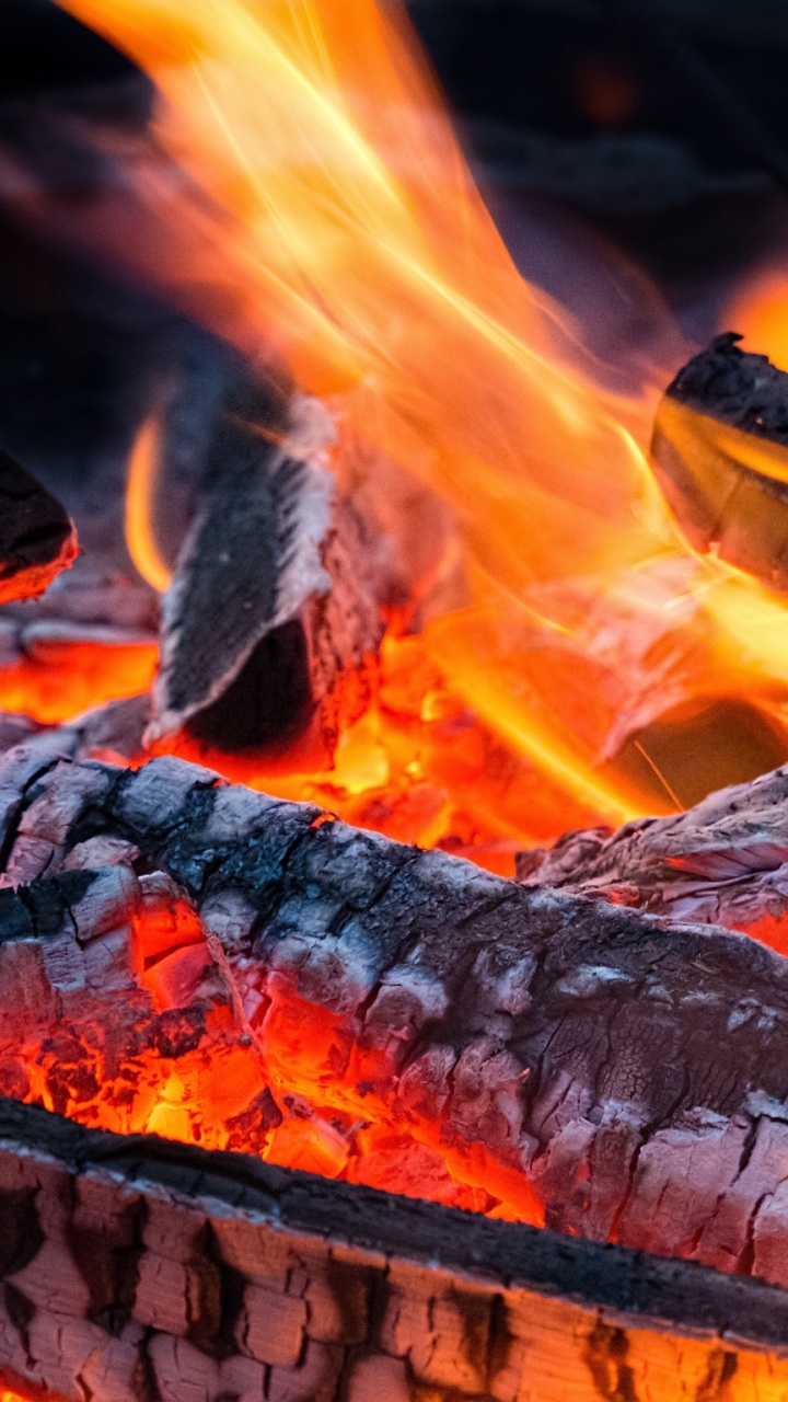 Burning Firewood on Fire Pit. Wallpaper in 720x1280 Resolution