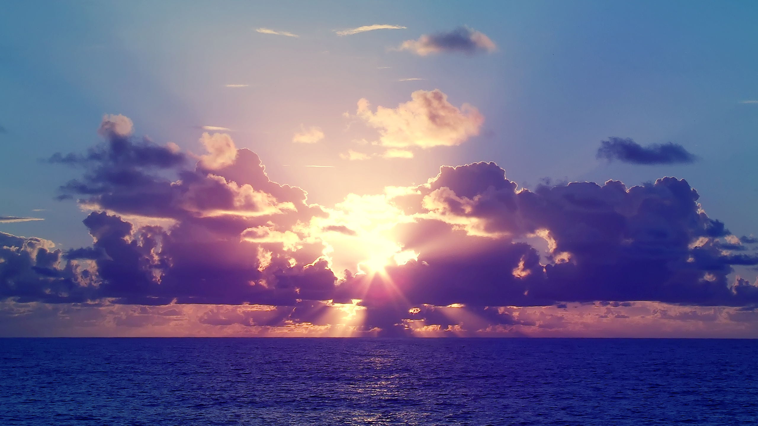 Body of Water Under Blue Sky During Sunset. Wallpaper in 2560x1440 Resolution