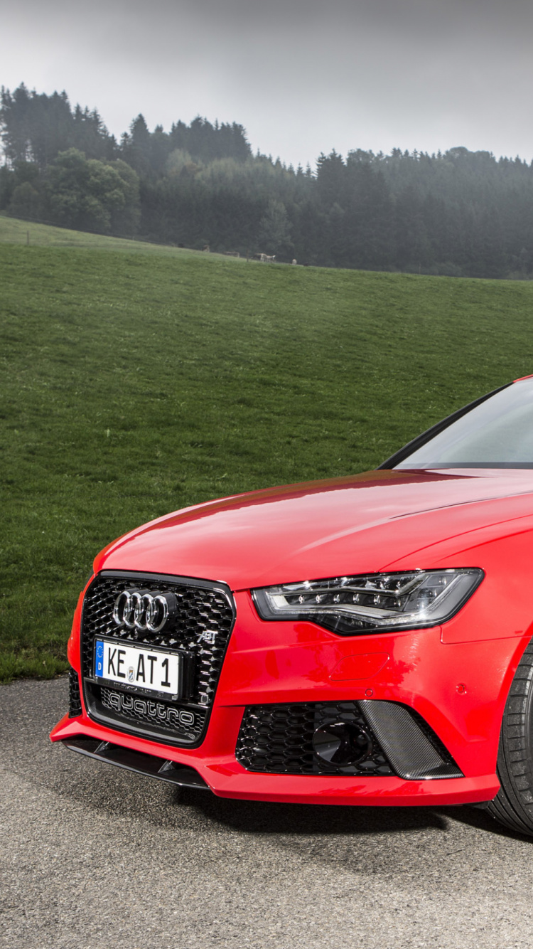 Audi Coupe Rojo en Campo de Hierba Verde Durante el Día. Wallpaper in 750x1334 Resolution