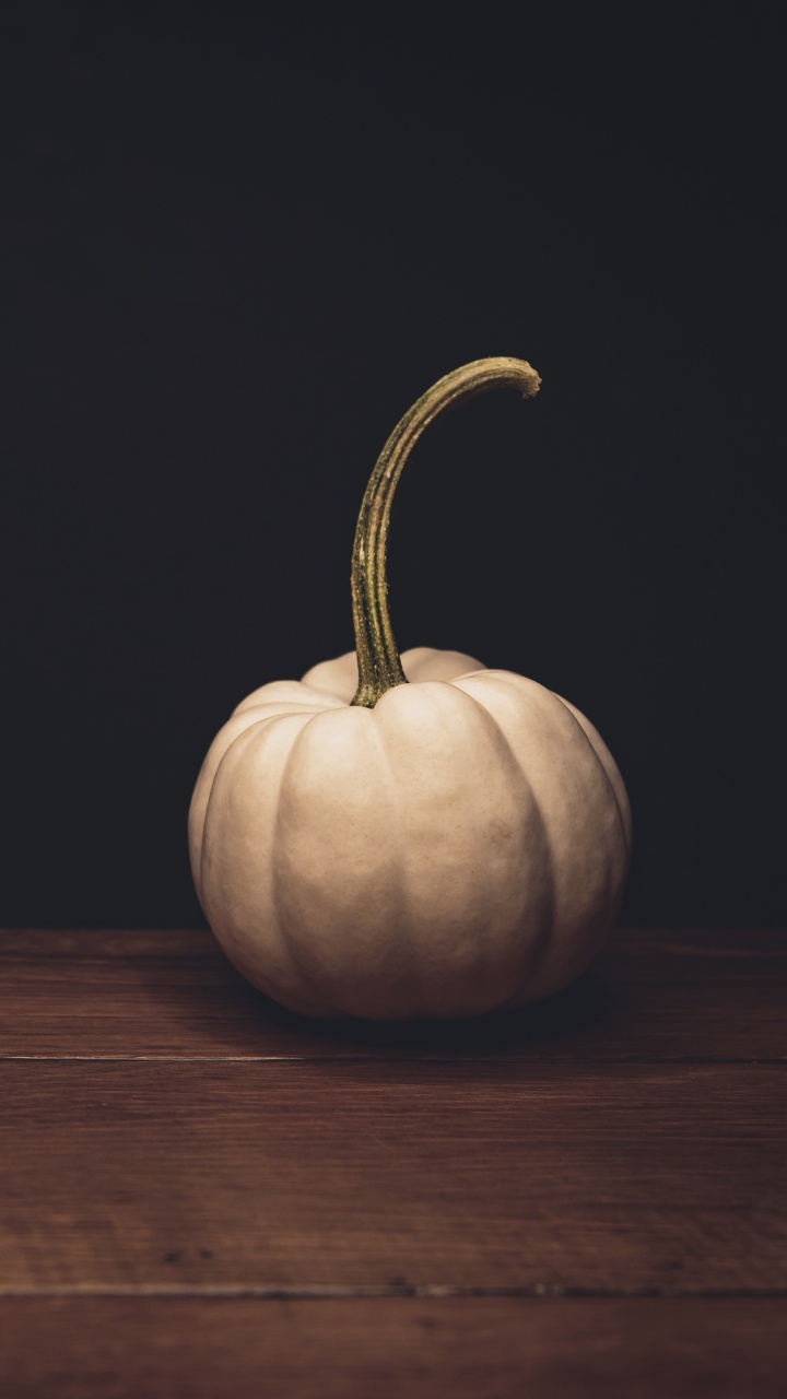 Pumpkin on Brown Wooden Table. Wallpaper in 720x1280 Resolution