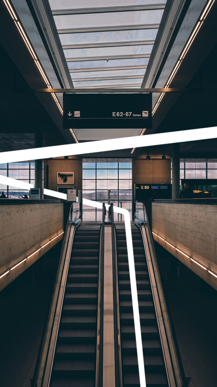 Gray and Black Escalator Inside Building. Wallpaper in 750x1334 Resolution