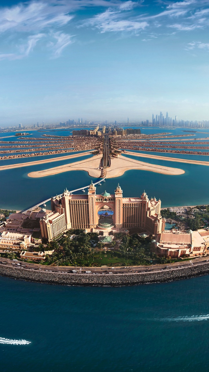 Aerial View of City Buildings Near Body of Water During Daytime. Wallpaper in 720x1280 Resolution