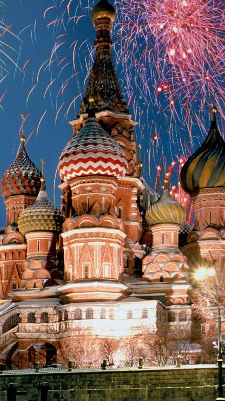 Brown and Blue Concrete Building Under Blue Sky During Daytime. Wallpaper in 750x1334 Resolution