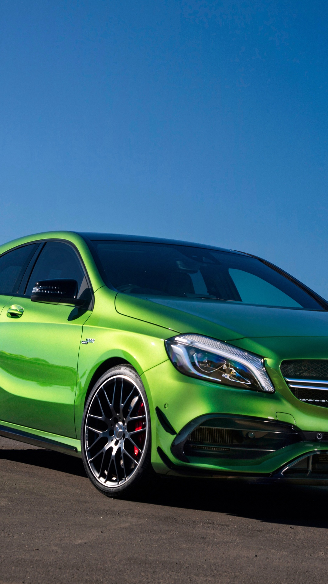 Green Mercedes Benz Coupe on Black Asphalt Road. Wallpaper in 1080x1920 Resolution