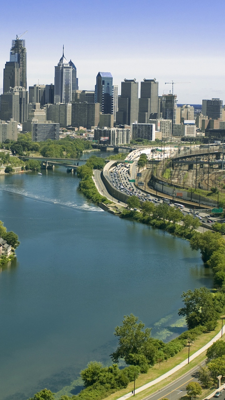Vista Aérea de Los Edificios de la Ciudad Durante el Día.. Wallpaper in 720x1280 Resolution
