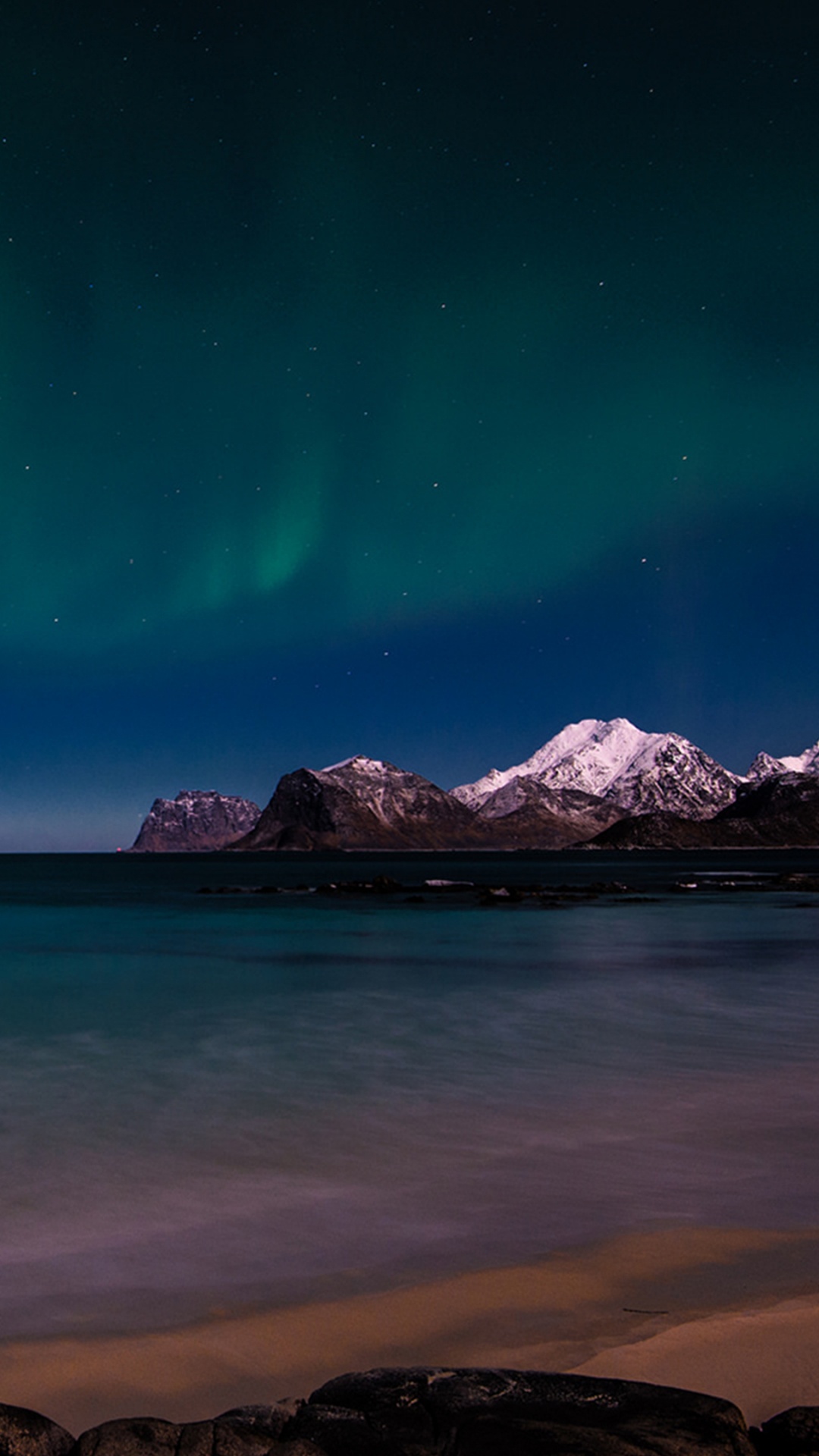 Blue and Green Sky Over Rocky Shore. Wallpaper in 1080x1920 Resolution