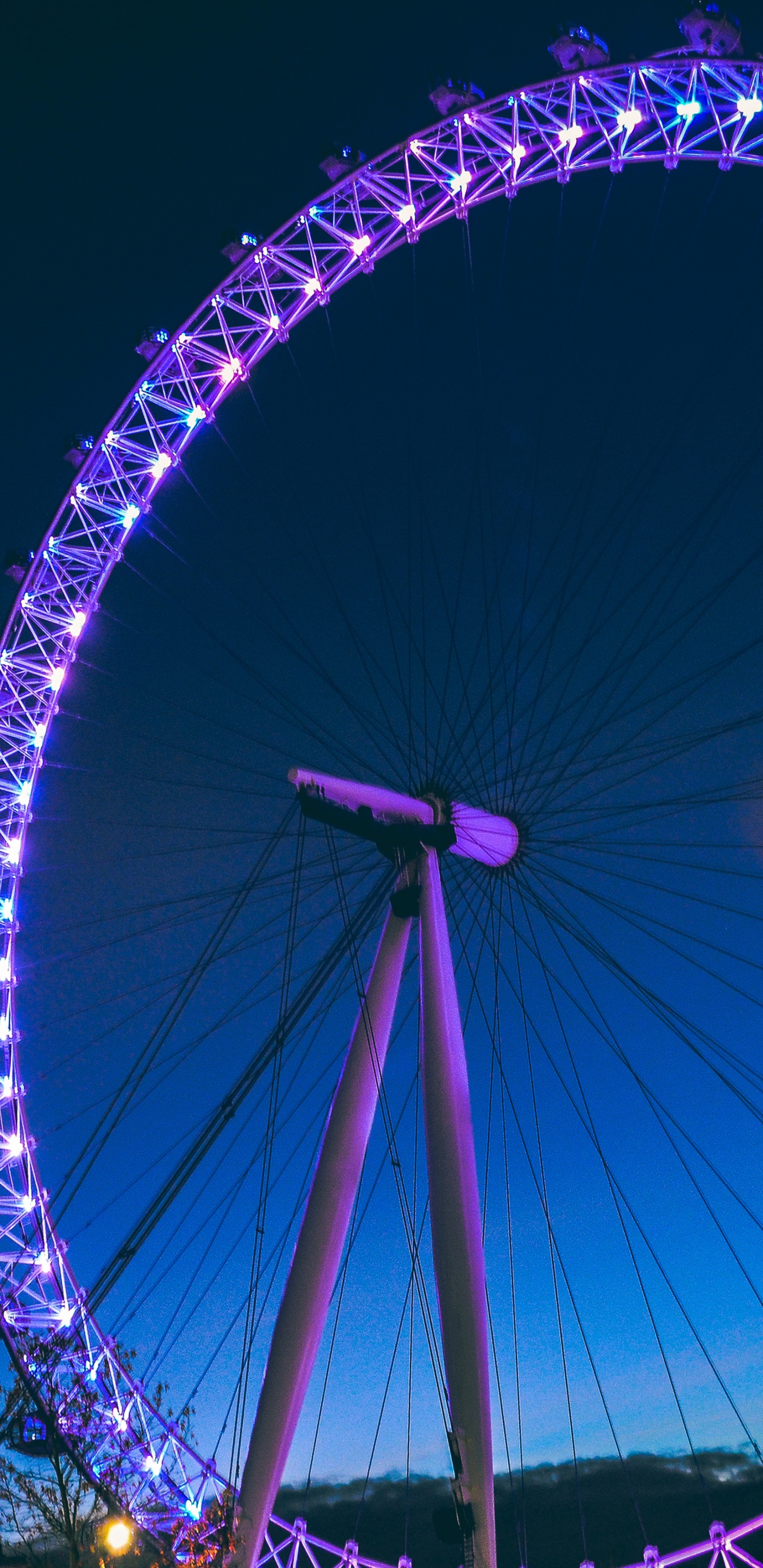 Ferris Wheel With Lights Turned on During Night Time. Wallpaper in 1440x2960 Resolution