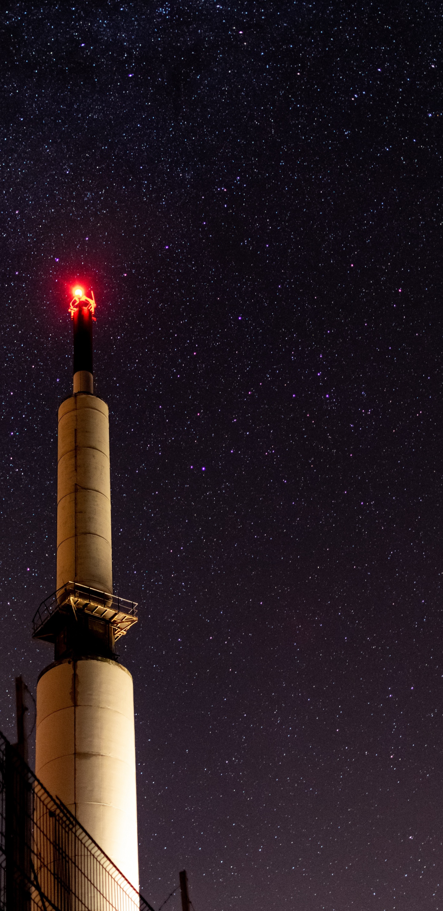 White and Brown Tower Under Starry Night. Wallpaper in 1440x2960 Resolution