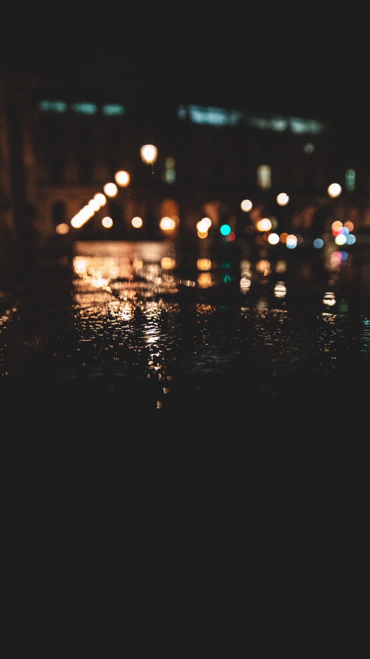 Bokeh-Fotografie Der Lichter Der Stadt Während Der Nacht. Wallpaper in 720x1280 Resolution