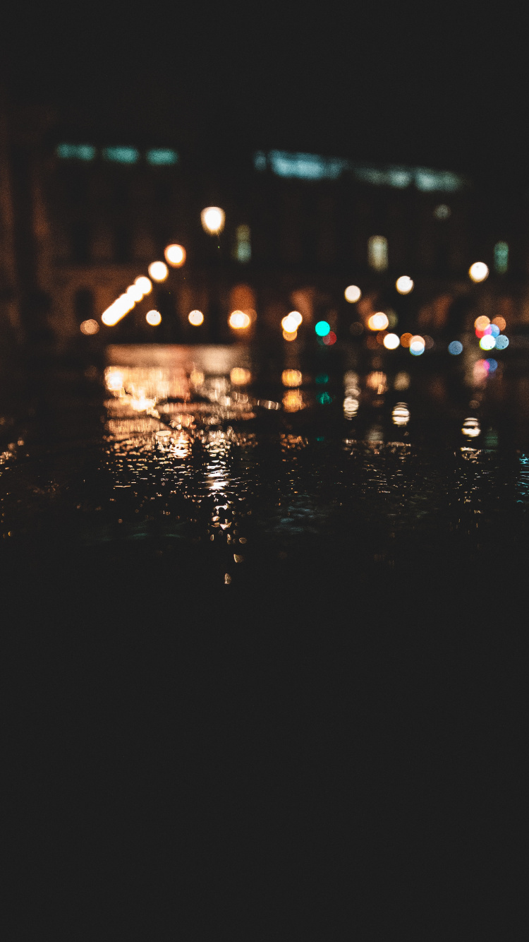 Bokeh-Fotografie Der Lichter Der Stadt Während Der Nacht. Wallpaper in 750x1334 Resolution