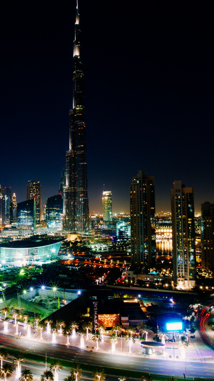 City Buildings During Night Time. Wallpaper in 750x1334 Resolution