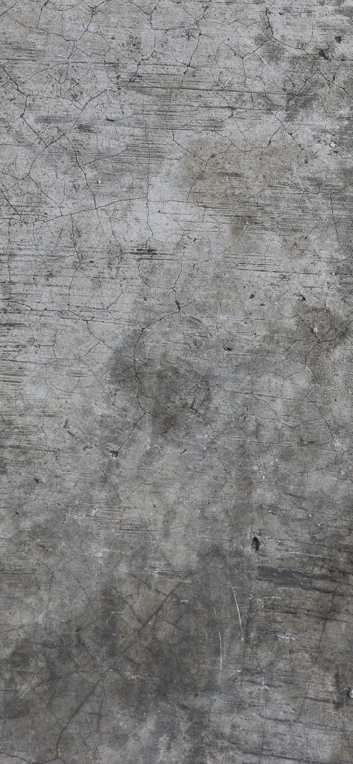 Sol en Béton Gris et Noir. Wallpaper in 1125x2436 Resolution