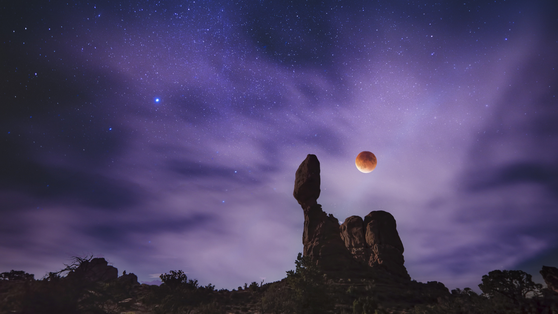 Silhouette of Man and Woman Sitting on Rock Under Starry Night. Wallpaper in 1920x1080 Resolution