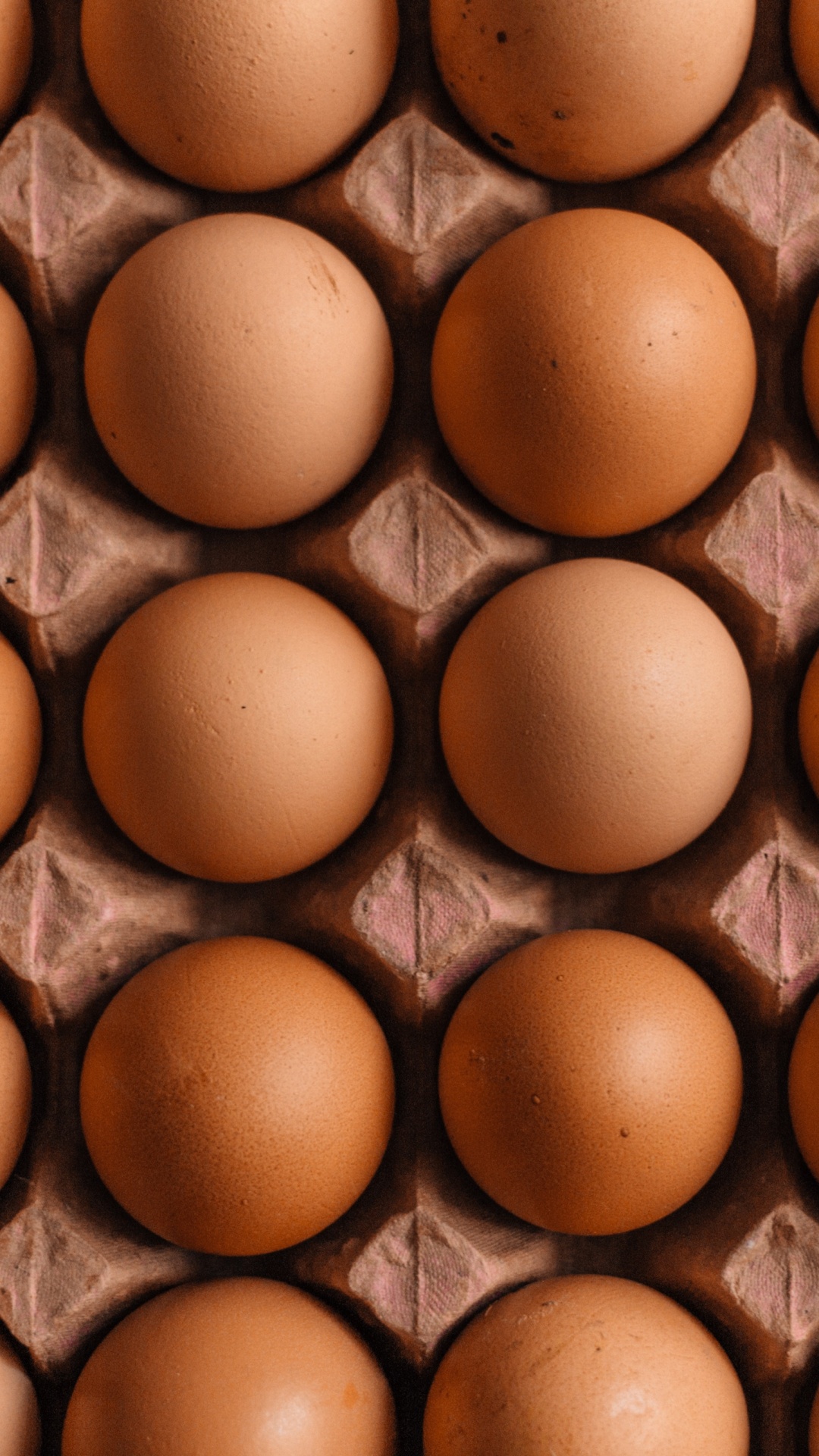 Brown Egg Tray on Brown Wooden Table. Wallpaper in 1080x1920 Resolution