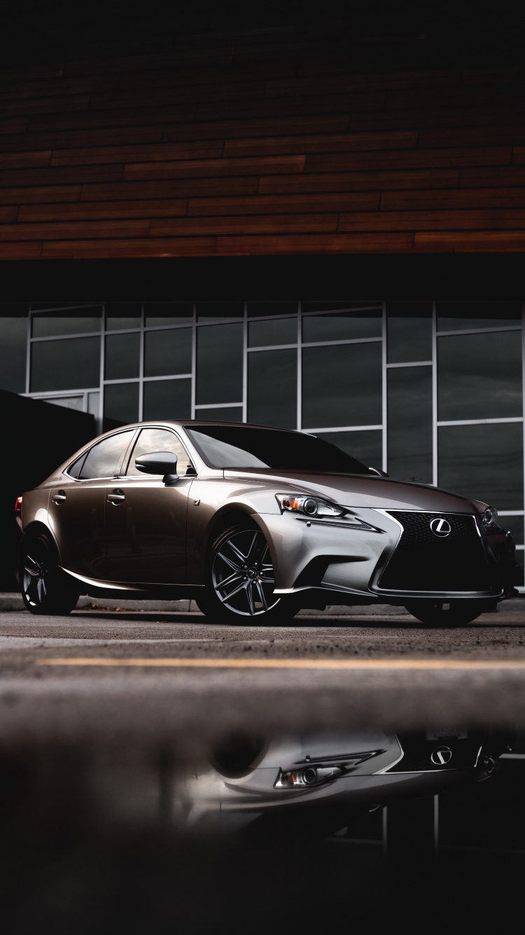 Porsche 911 Noire Garée Sur Parking. Wallpaper in 750x1334 Resolution