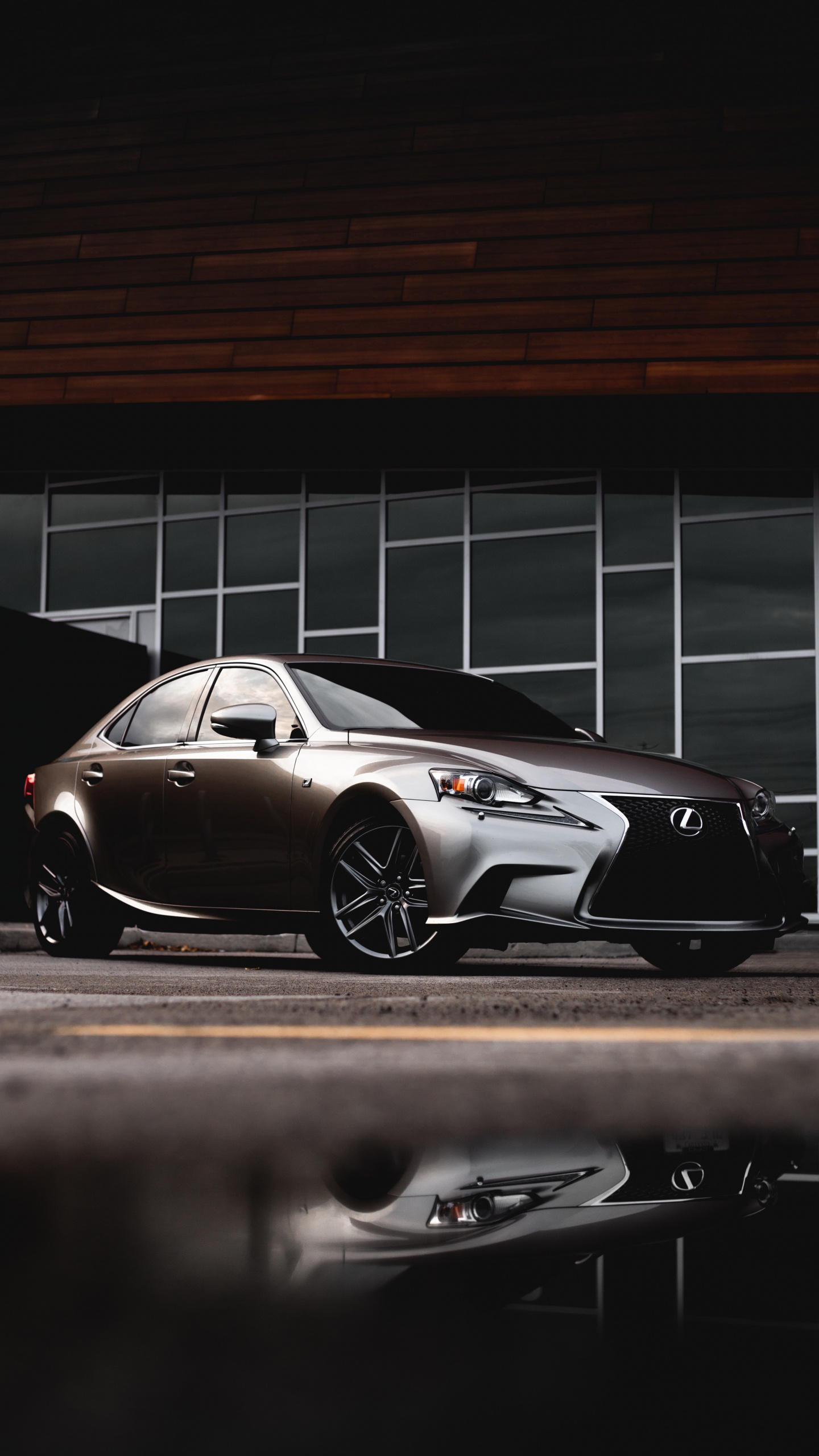 Black Porsche 911 Parked on Parking Lot. Wallpaper in 1440x2560 Resolution