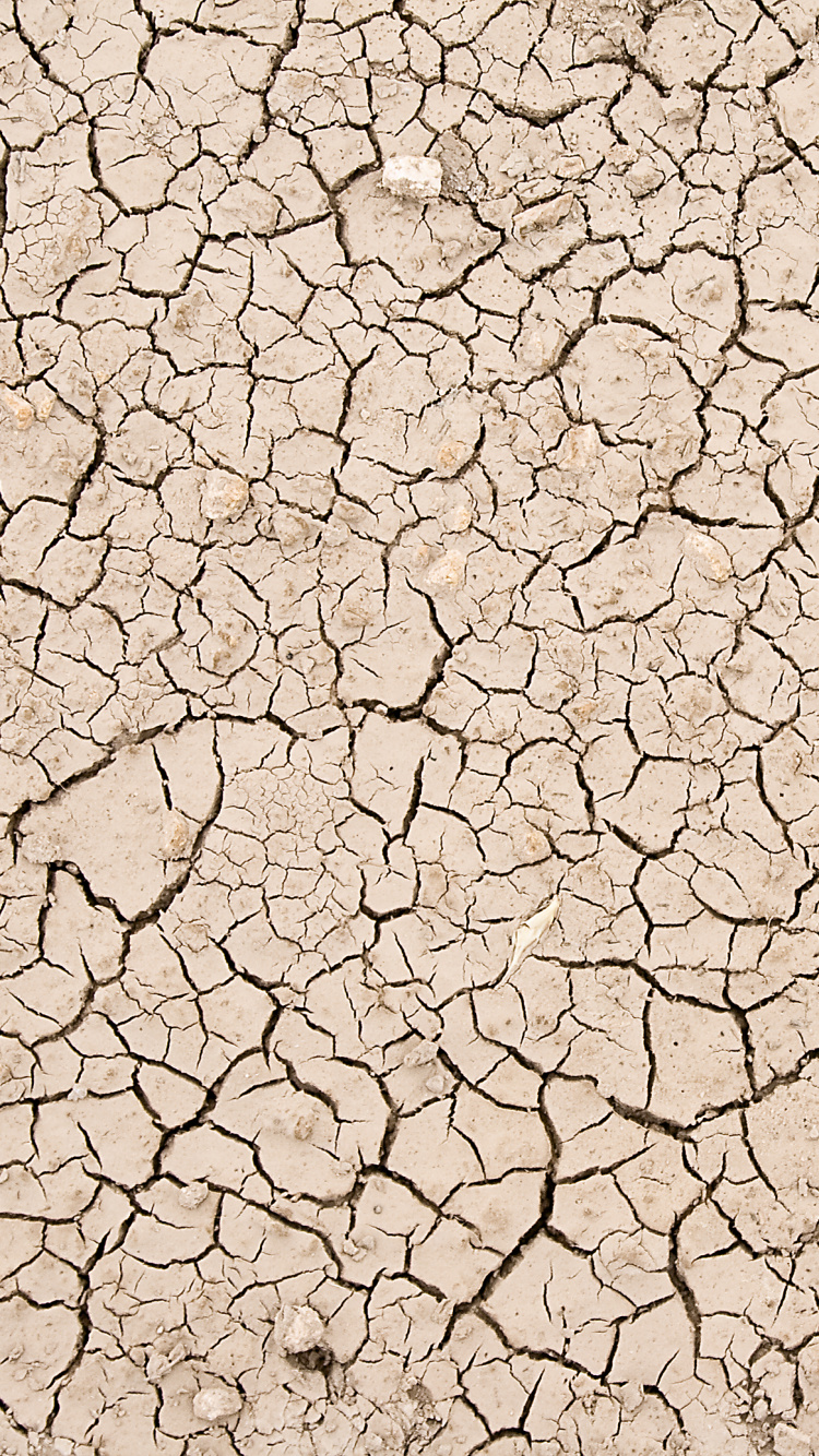 Brauner Und Weißer Betonboden. Wallpaper in 750x1334 Resolution