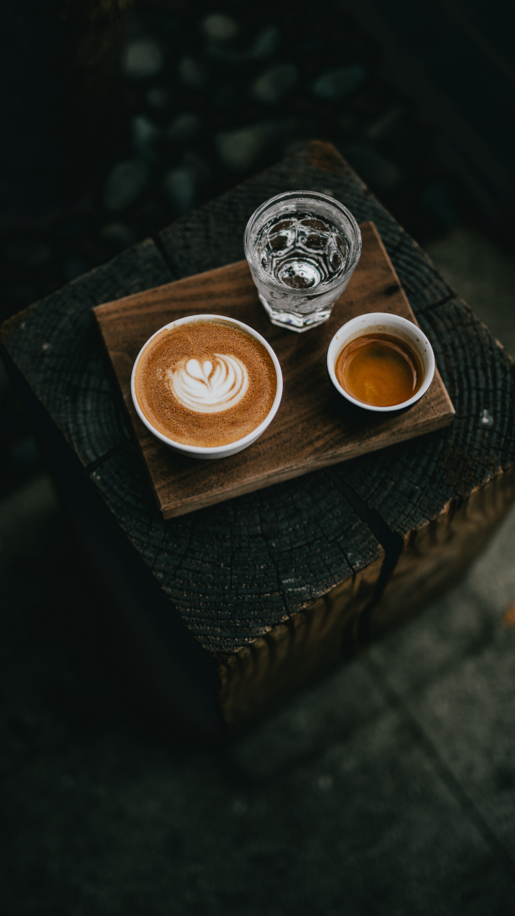 Cappuccino in Brown Ceramic Mug on Brown Wooden Table. Wallpaper in 750x1334 Resolution