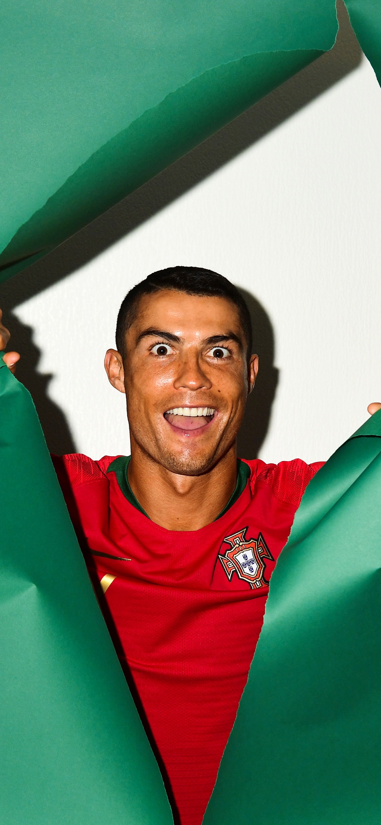 Man in Red Polo Shirt Smiling. Wallpaper in 1242x2688 Resolution