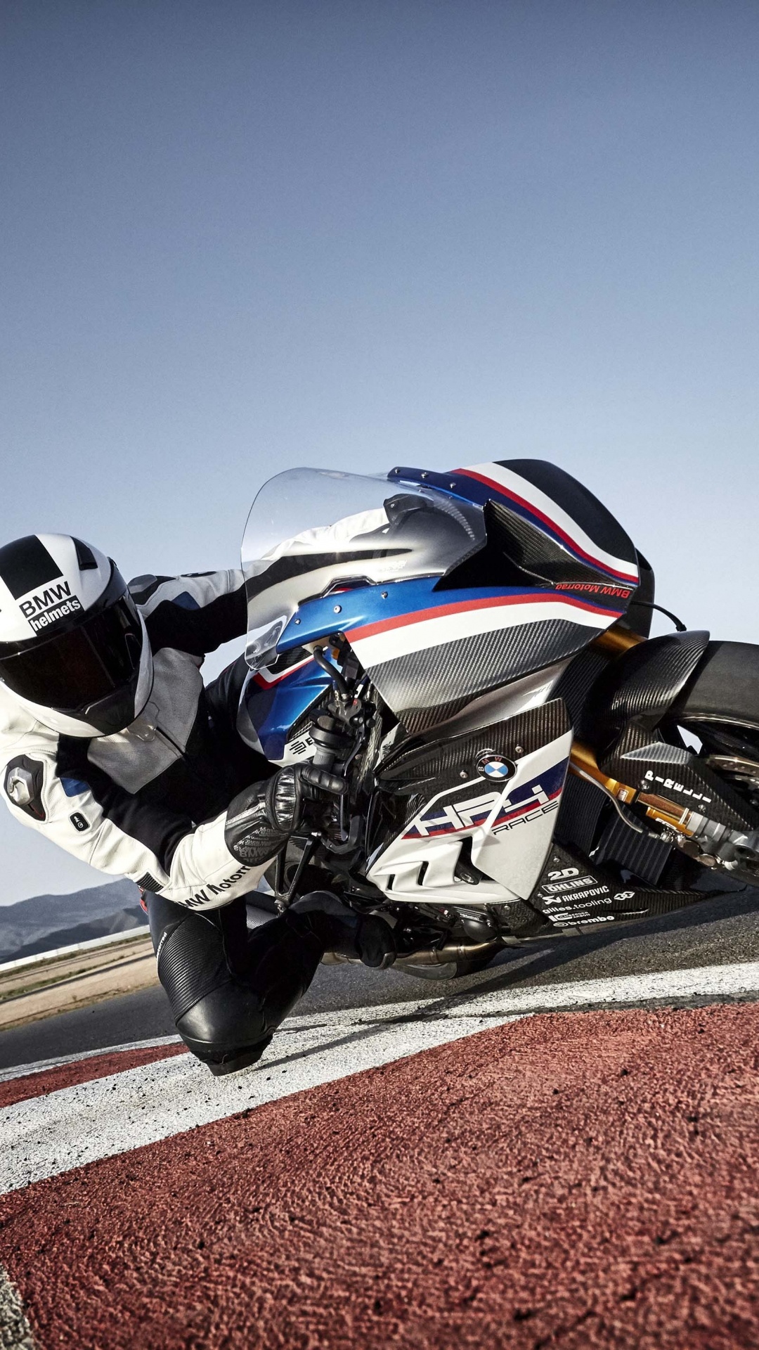 Man in Black and White Motorcycle Helmet Riding Black Sports Bike on Road During Daytime. Wallpaper in 1080x1920 Resolution