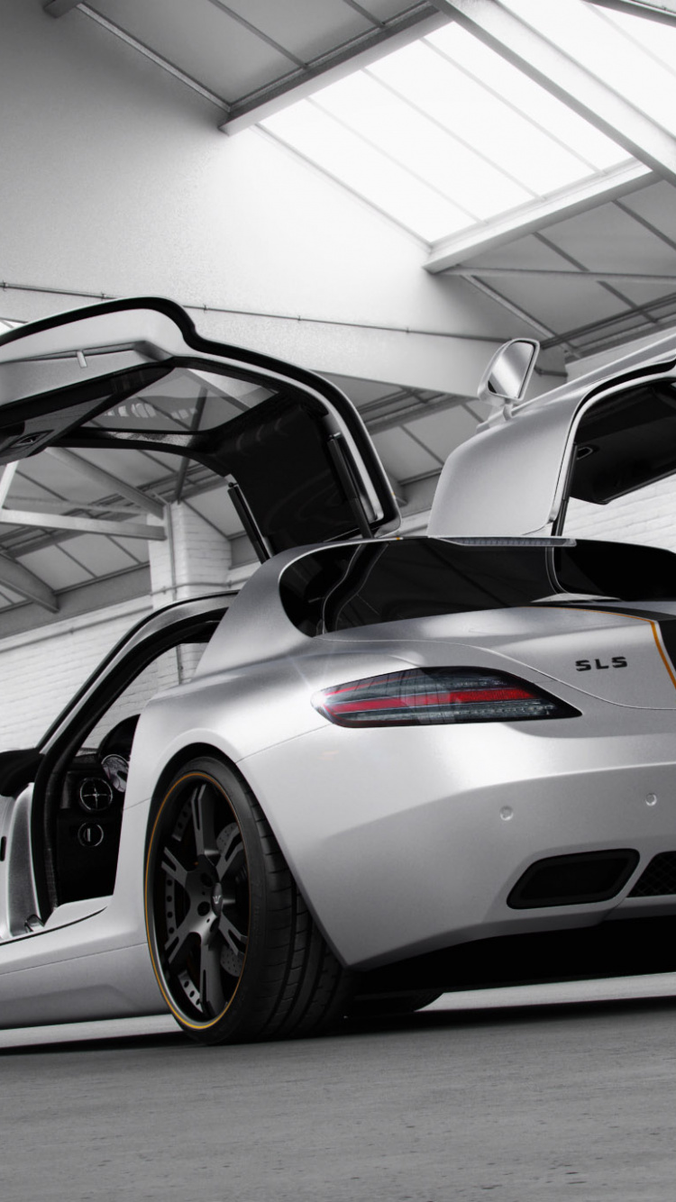 White and Black Porsche 911 Parked in a Garage. Wallpaper in 750x1334 Resolution