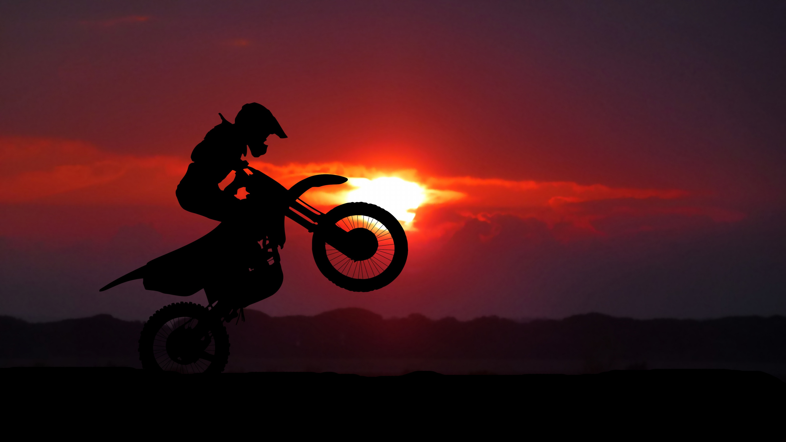 Silhouette of Man Riding Motocross Dirt Bike Pendant le Coucher du Soleil. Wallpaper in 2560x1440 Resolution