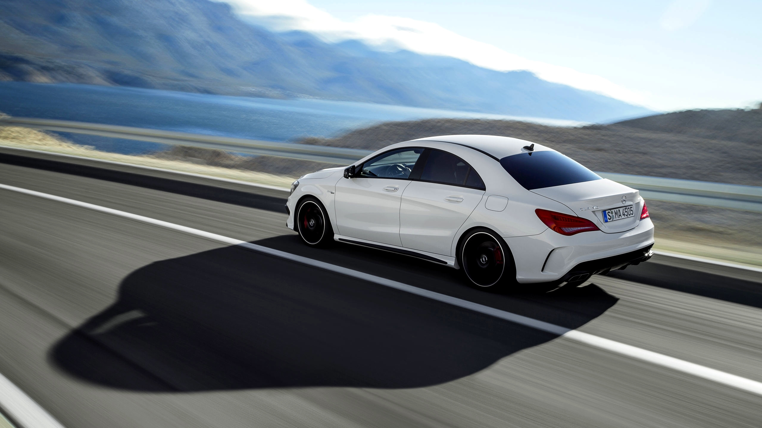 White Porsche 911 on Road During Daytime. Wallpaper in 2560x1440 Resolution