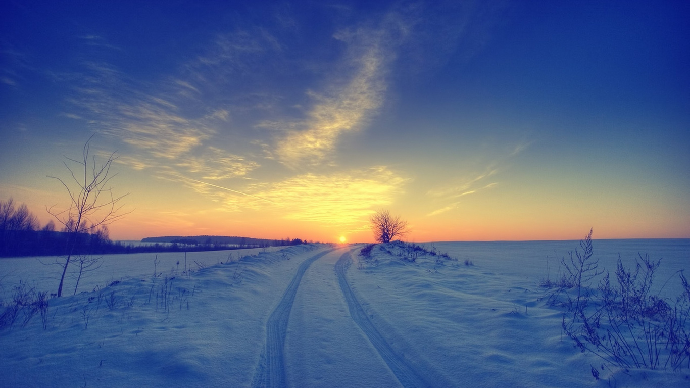 Snow Covered Field During Sunset. Wallpaper in 1366x768 Resolution