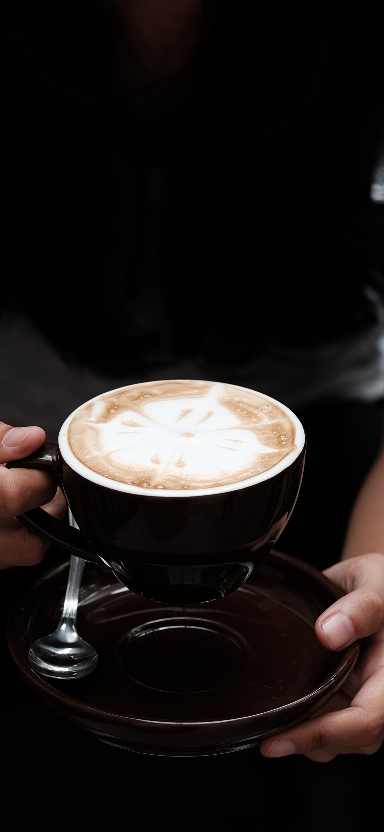Woman in Black Shirt Holding Cup of Coffee. Wallpaper in 1242x2688 Resolution