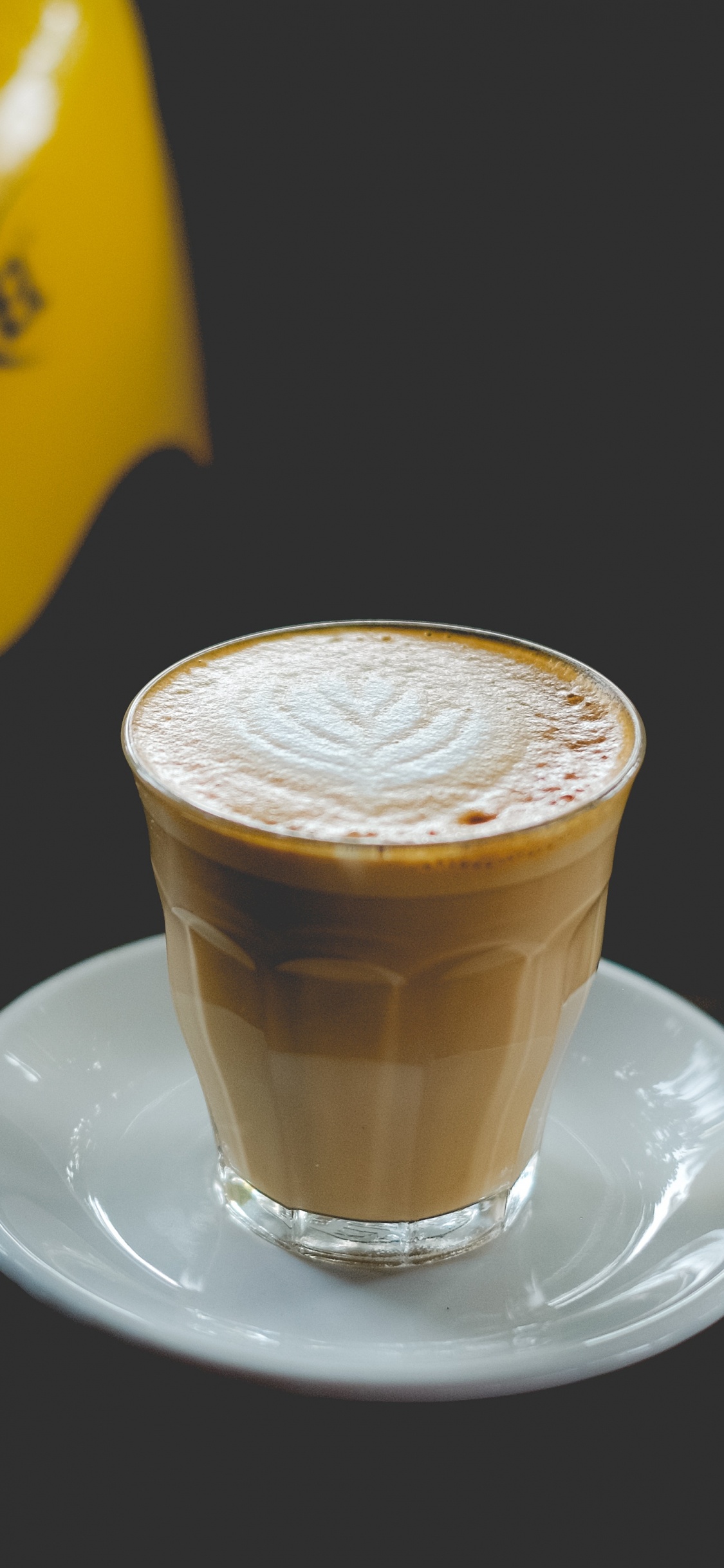 Yellow Ceramic Mug on White Ceramic Saucer. Wallpaper in 1125x2436 Resolution