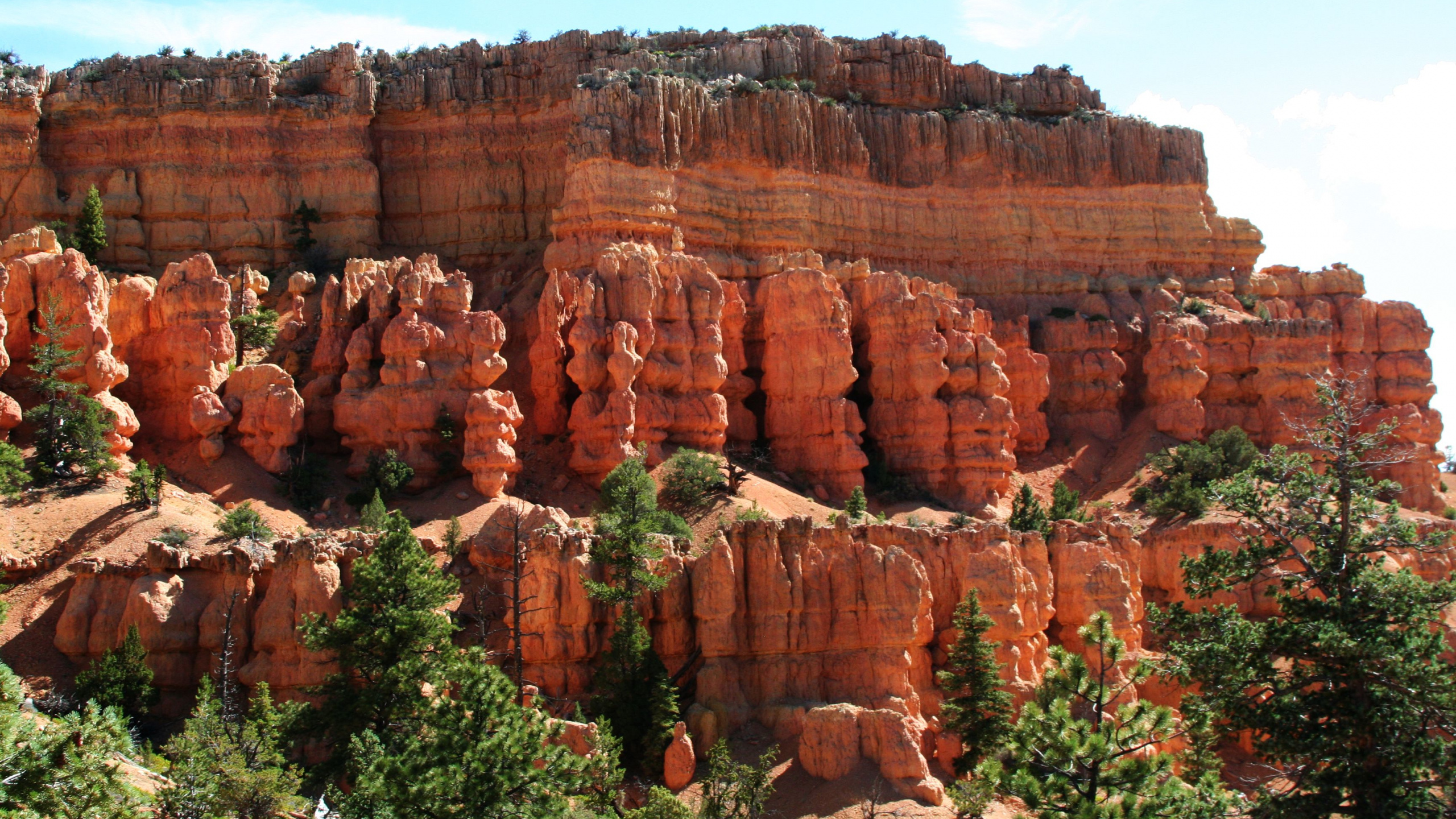 Brown Rock Formation Under Blue Sky During Daytime. Wallpaper in 2560x1440 Resolution