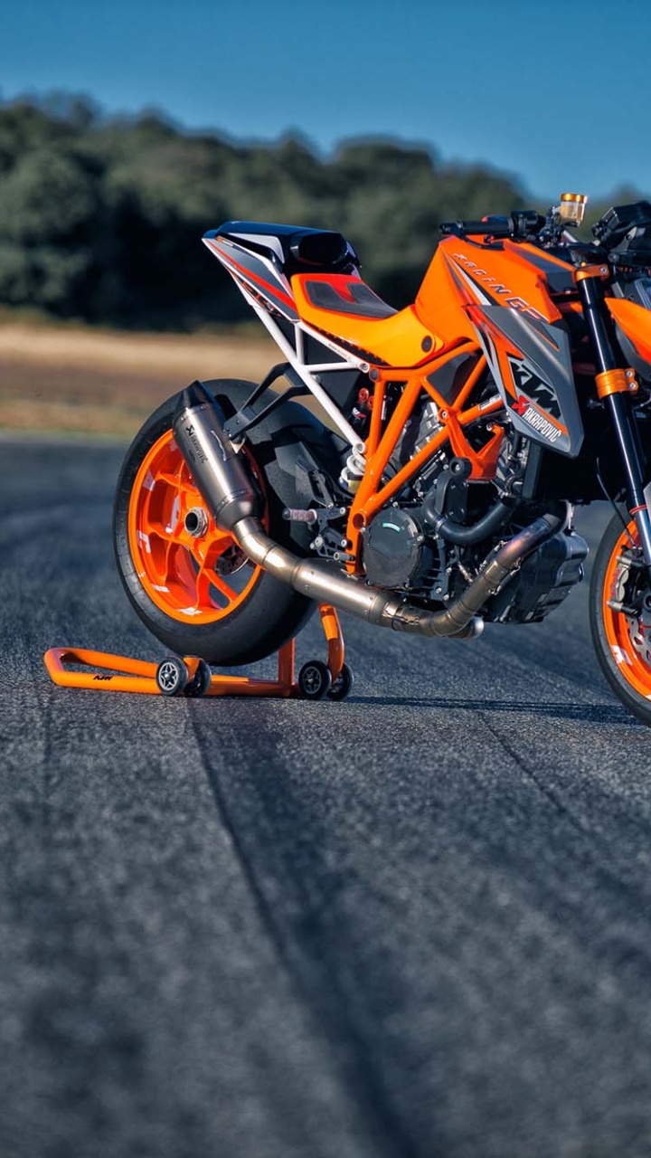 Orange and Black Sports Bike on Road During Daytime. Wallpaper in 720x1280 Resolution