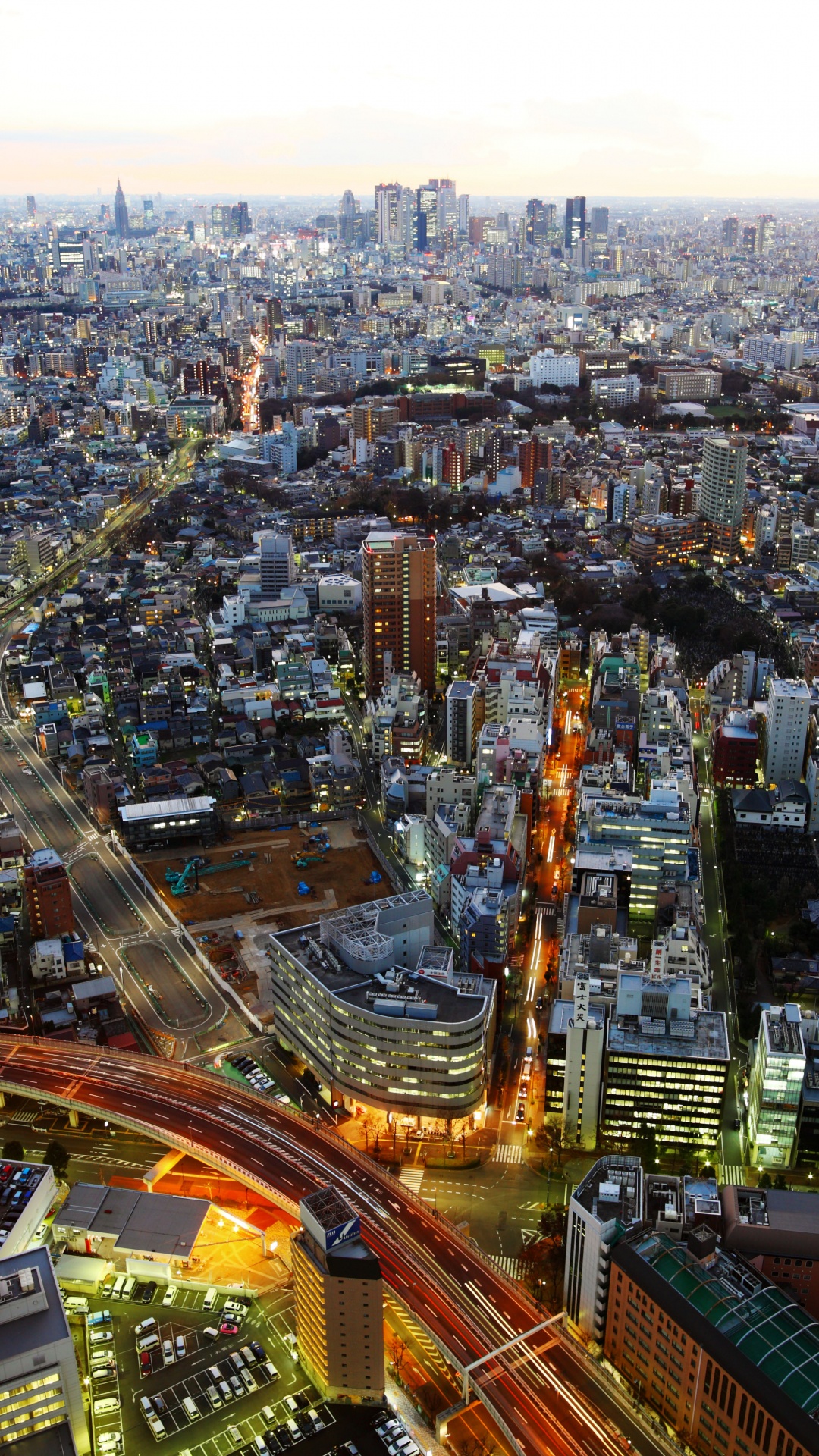 Aerial View of City Buildings During Night Time. Wallpaper in 1080x1920 Resolution