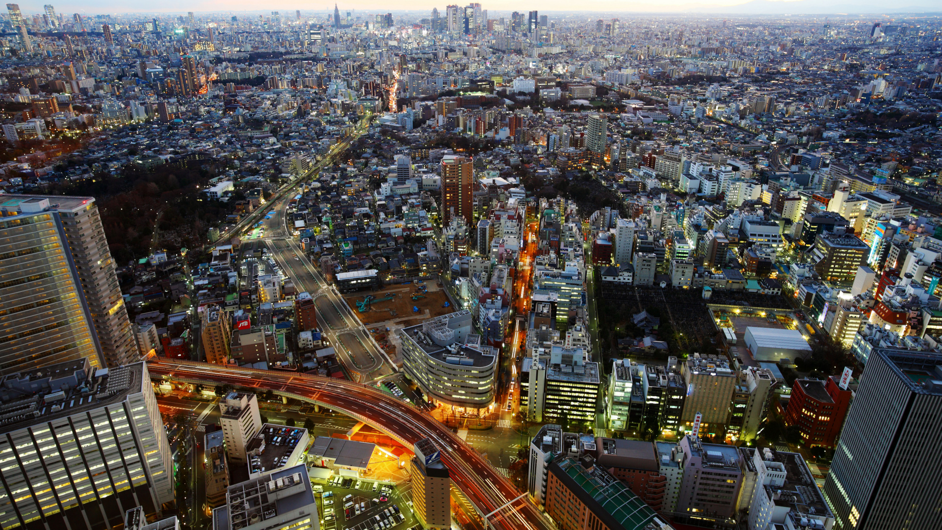 Aerial View of City Buildings During Night Time. Wallpaper in 1920x1080 Resolution