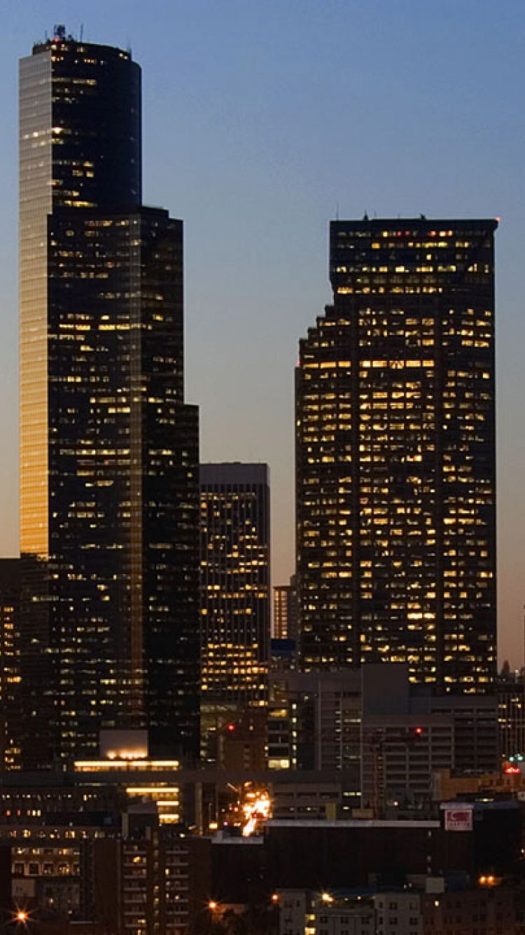 City Buildings During Night Time. Wallpaper in 750x1334 Resolution