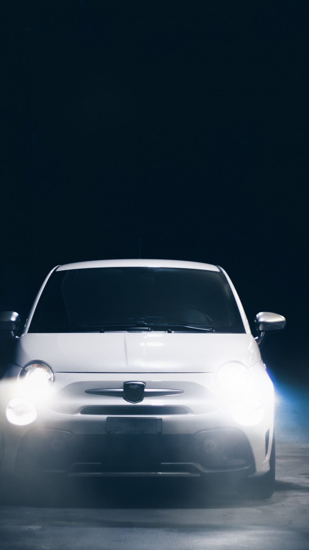 White Car in a Dark Room. Wallpaper in 1080x1920 Resolution