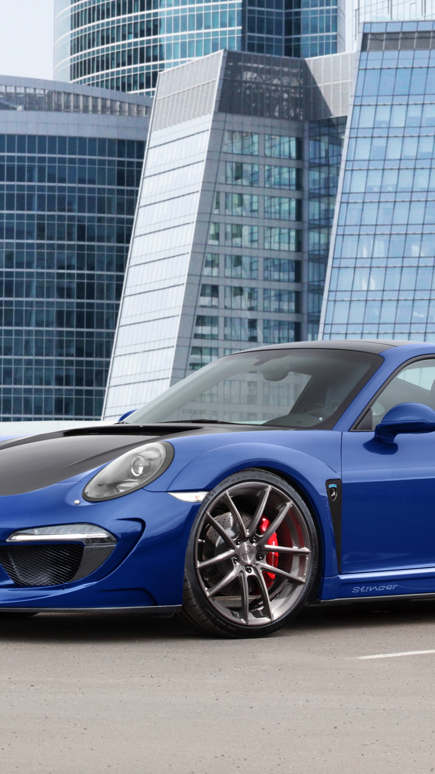 Blue Bmw m 3 Coupe Parked Near White Concrete Building During Daytime. Wallpaper in 1440x2560 Resolution